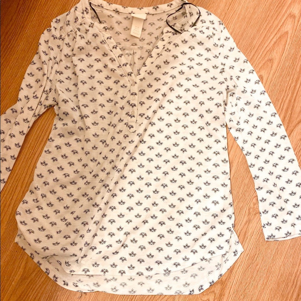 White and black shirt.